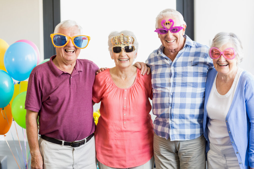 Seniors wearing funny glasses